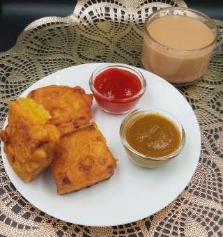 Enjoy the delightful and crunchy Irresistible Bread Pakora Recipe as a snack or appetizer! Perfectly paired with a hot cup of tea.