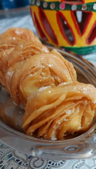 Delicious Pheni dessert on tray.