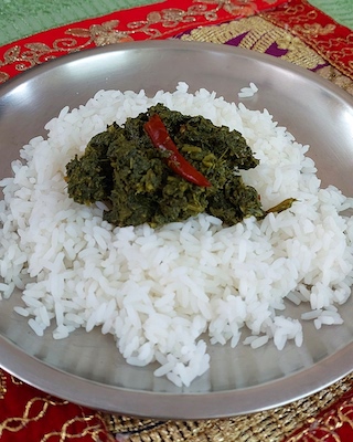 A delicious bathua saag with white rice.