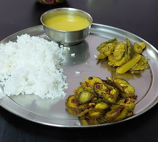 Kakrol ki Recipe - Spiny Gourd Fry, Crispy Delight served with dal and rice.
